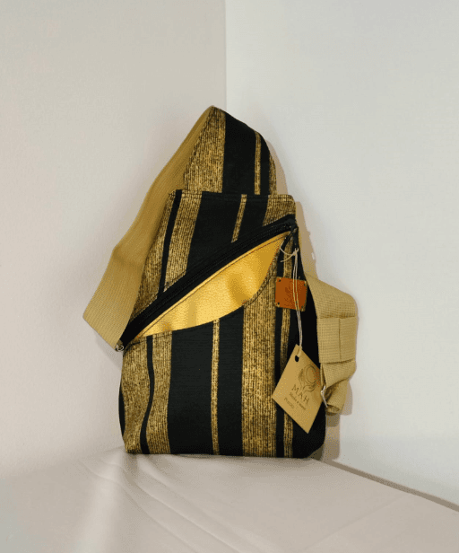 Bandolera, color dorado y negro
